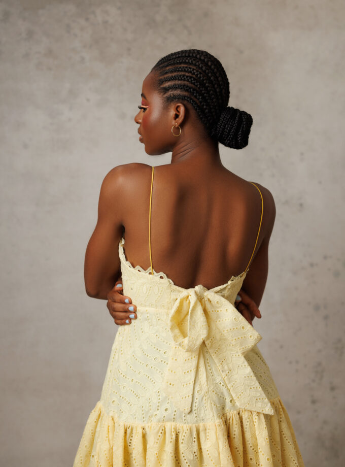 YELLOW SLEEVELESS MAXI DRESS WITH TIE KNOT BACK DETAIL